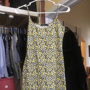 Yellow bodycon dress.